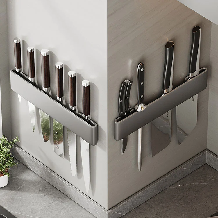 Magnetisch aan de muur gemonteerd messenrek